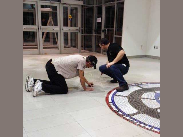 Post Construction Cleanup - South Queens Middle School - cleaning tiled floor